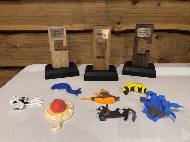 The finished tokens with this year’s trophies
